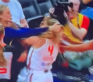 VIDEO : SHOCKING COURT BRAWL — Sophie Cunningham throws down and pulls hair in chaotic WNBA showdown after Caitlin Clark is shoved.