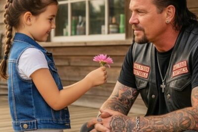 He rode into the quiet town just as the sun began to dip behind the horizon, casting long shadows over the dusty road. The rumble of his Harley echoed through the silence, turning every head and freezing every conversation. People stopped what they were doing. Children were pulled inside. Old men lowered their hats, and mothers locked their doors.