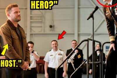 Hangar Four stood dressed in ceremony. Flags hung in precise intervals along steel beams. A backdrop bearing the Navy Seal trident loomed behind the podium. Rows of folding chairs stretched toward the back filled with officers in dress whites, families in their Sunday best, and a handful of civilians who’d earned invitations through proximity to greatness.